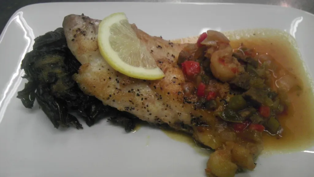 Pan Seared Sheepshead with Crispy Collard Cake and Creole Stew