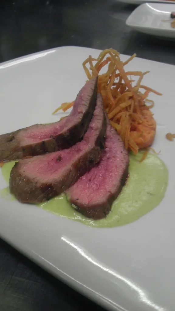 Sliced Leg of Lamb with Carrot Sformato & Sweet Pea Beurre Blanc